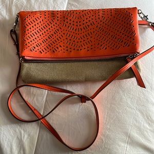 Stella & Dot, orange/tan fold over crossbody. Removable straps to become clutch.